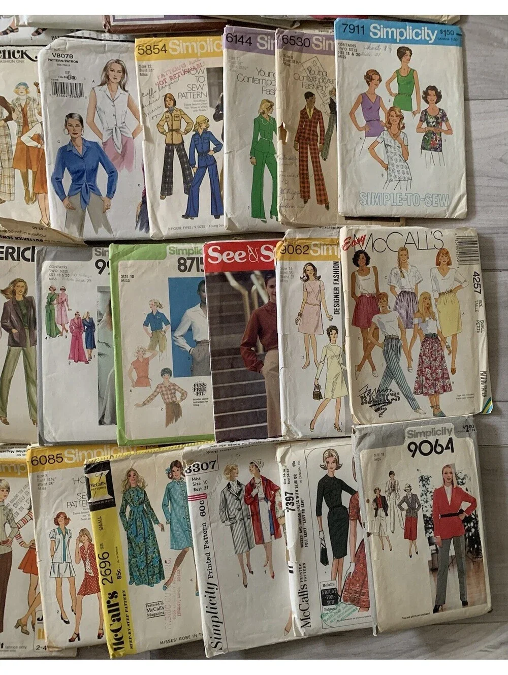 VINTAGE SEWING PATTERN lot of 28 Mixed Women Some Uncut And Cut